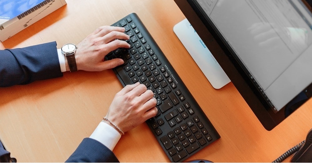 working at desk on computer